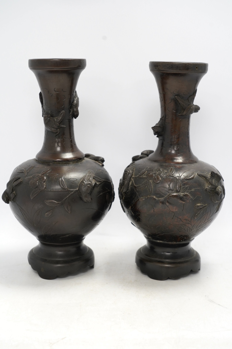 A pair of Chinese bronze vases, 31cm high. Condition - poor